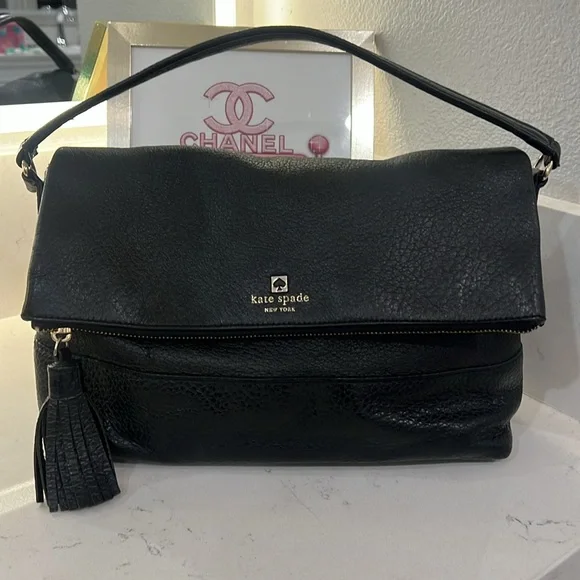 Kate spade everyday purse black leather with removable strap.